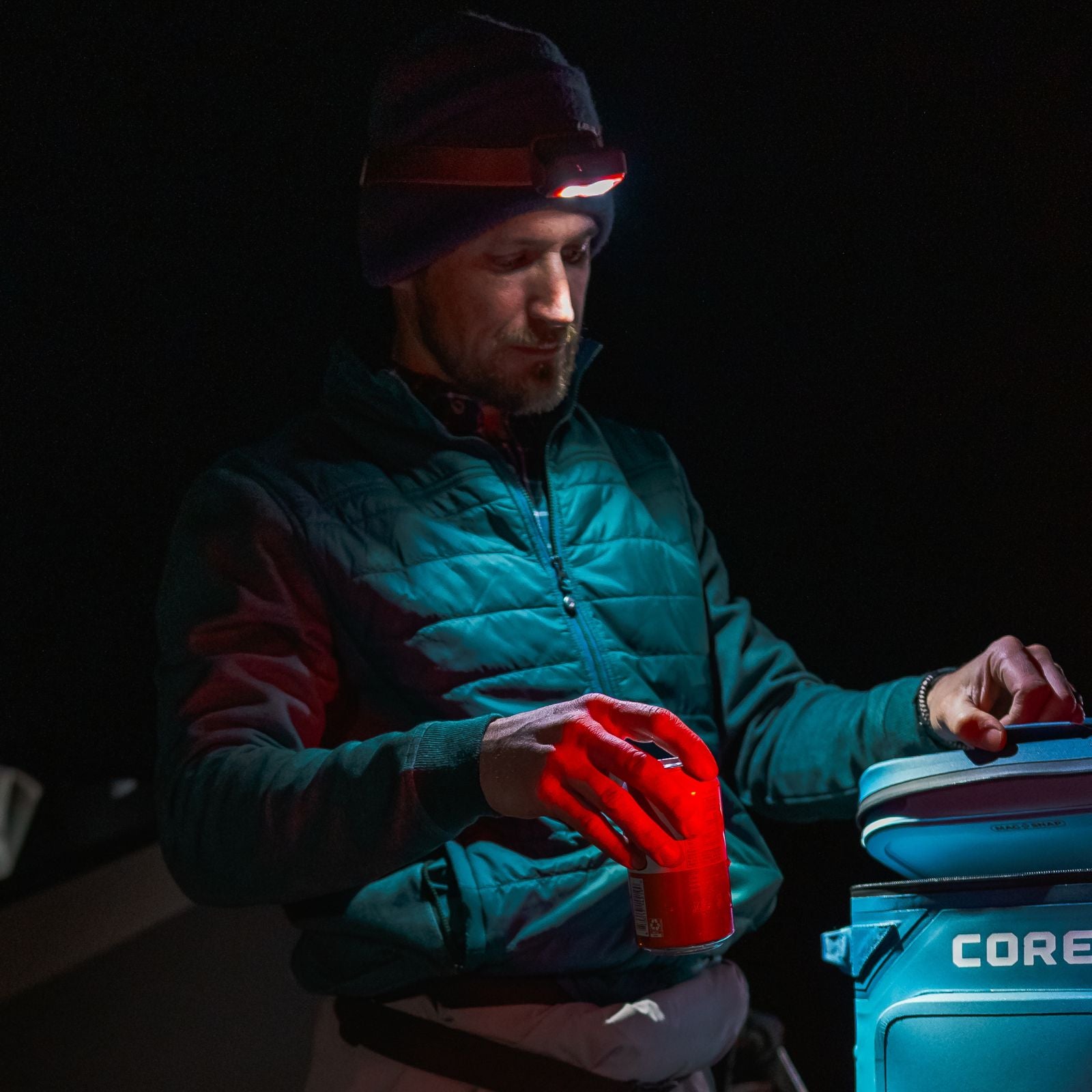 A person using a CORE headlamp at night.