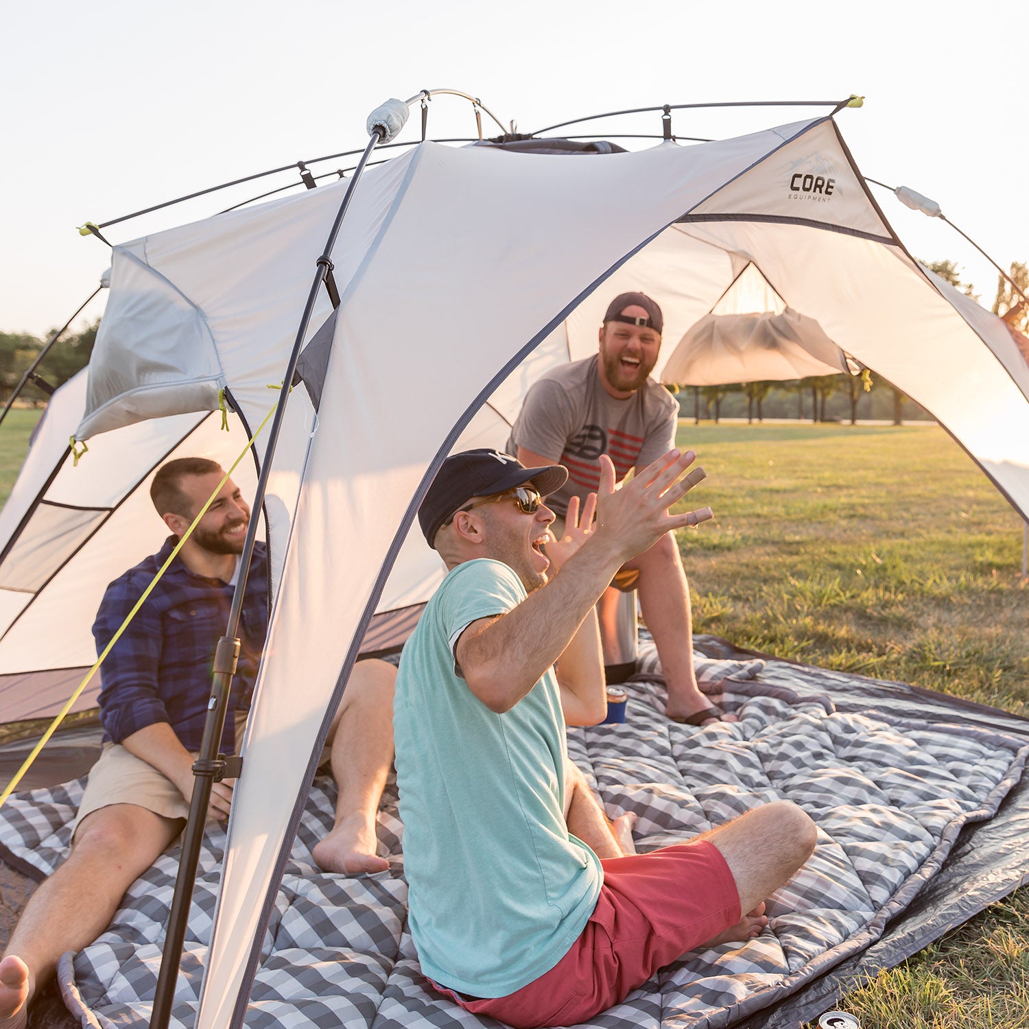 Core Equipment 8x8 Instant Sport Shade lifestyle image of friends at the park.