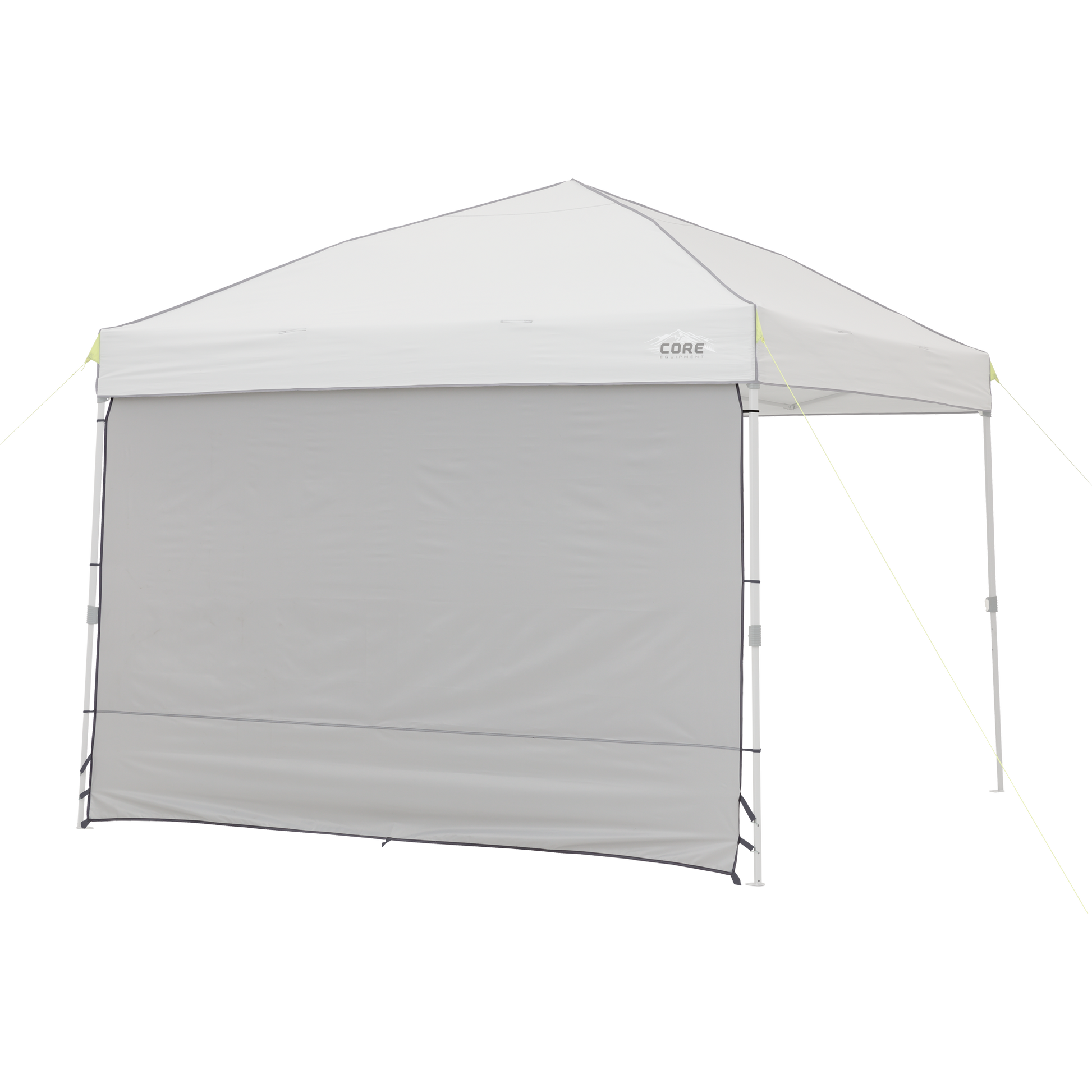 The 10' x 10' Sun Wall Accessory from CORE consists of a gray canopy tent with a triangular roof and a single gray sidewall. The sidewall extends from the top to the ground, providing shade and privacy. The canopy structure is supported by four legs, with ropes attached to the corners for stability.