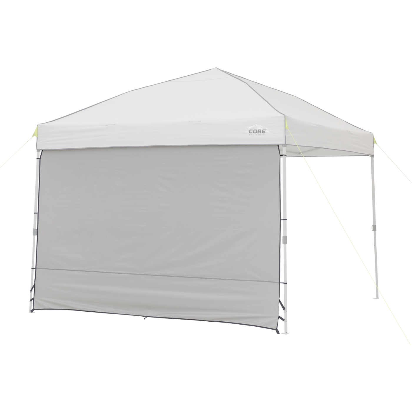 The 10' x 10' Sun Wall Accessory from CORE consists of a gray canopy tent with a triangular roof and a single gray sidewall. The sidewall extends from the top to the ground, providing shade and privacy. The canopy structure is supported by four legs, with ropes attached to the corners for stability.