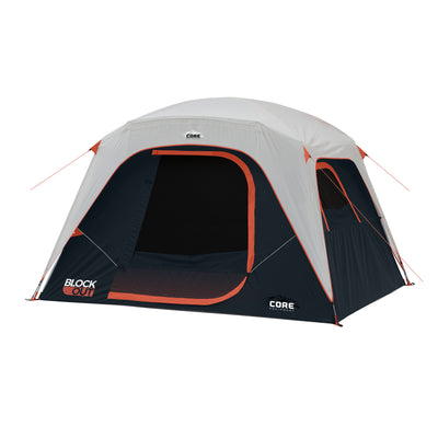 A black and gray camping tent with red trim and a black mesh front door, branded as "6 Person Dome Blockout Tent" by CORE. The tent has a dome-like top and logo "BLOCK OUT" on the lower left corner of the front. Red reflective guy lines are attached for stability.