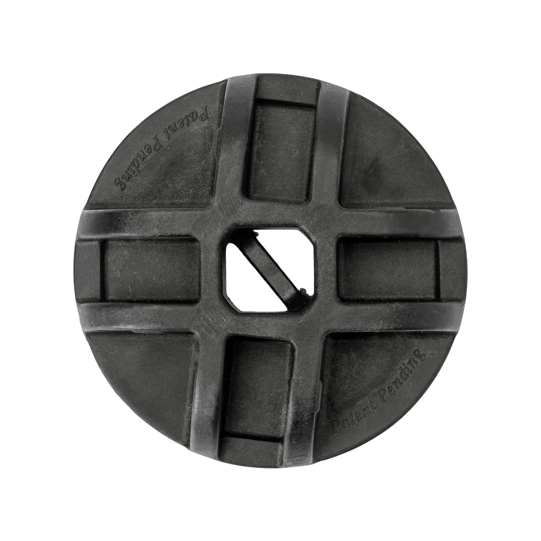 underside of black center hub with 4 slots for poles and a flat top