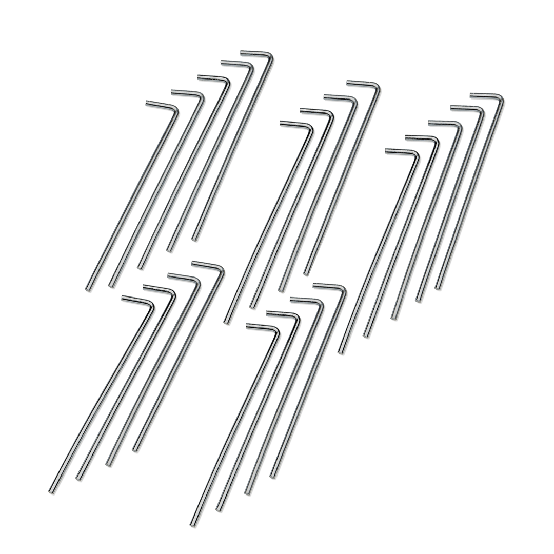 22 metal tent stakes on a black background