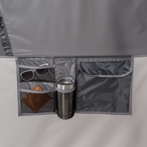 Close up of pocket in CORE 10 person straight wall cabin tent with full rainfly.