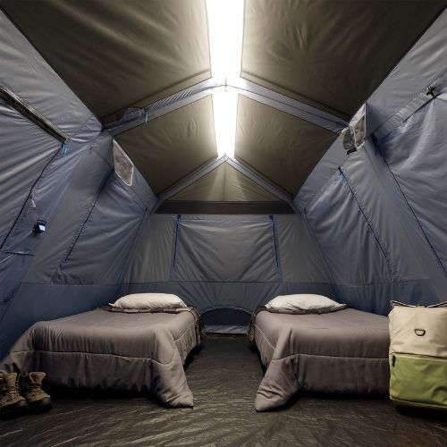 Two beds inside a CORE 10 person lighted instant cabin tent.