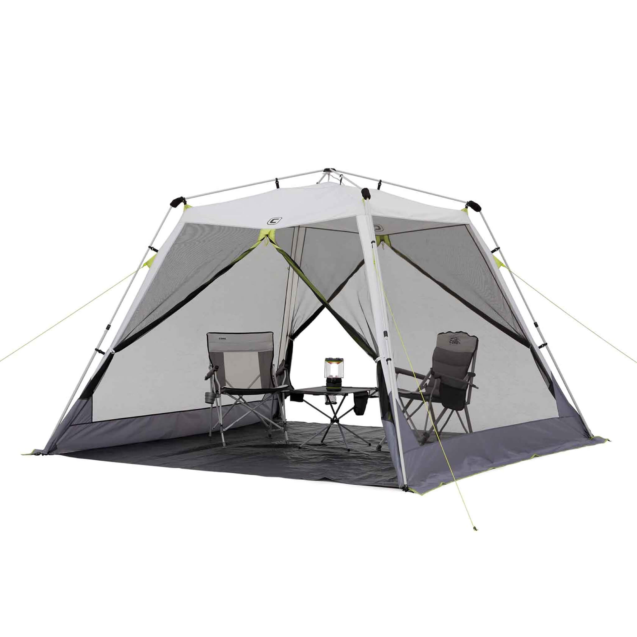 CORE 10 ft x 10 ft instant screen house with chairs and table set up inside, providing shaded bug-free outdoor shelter.