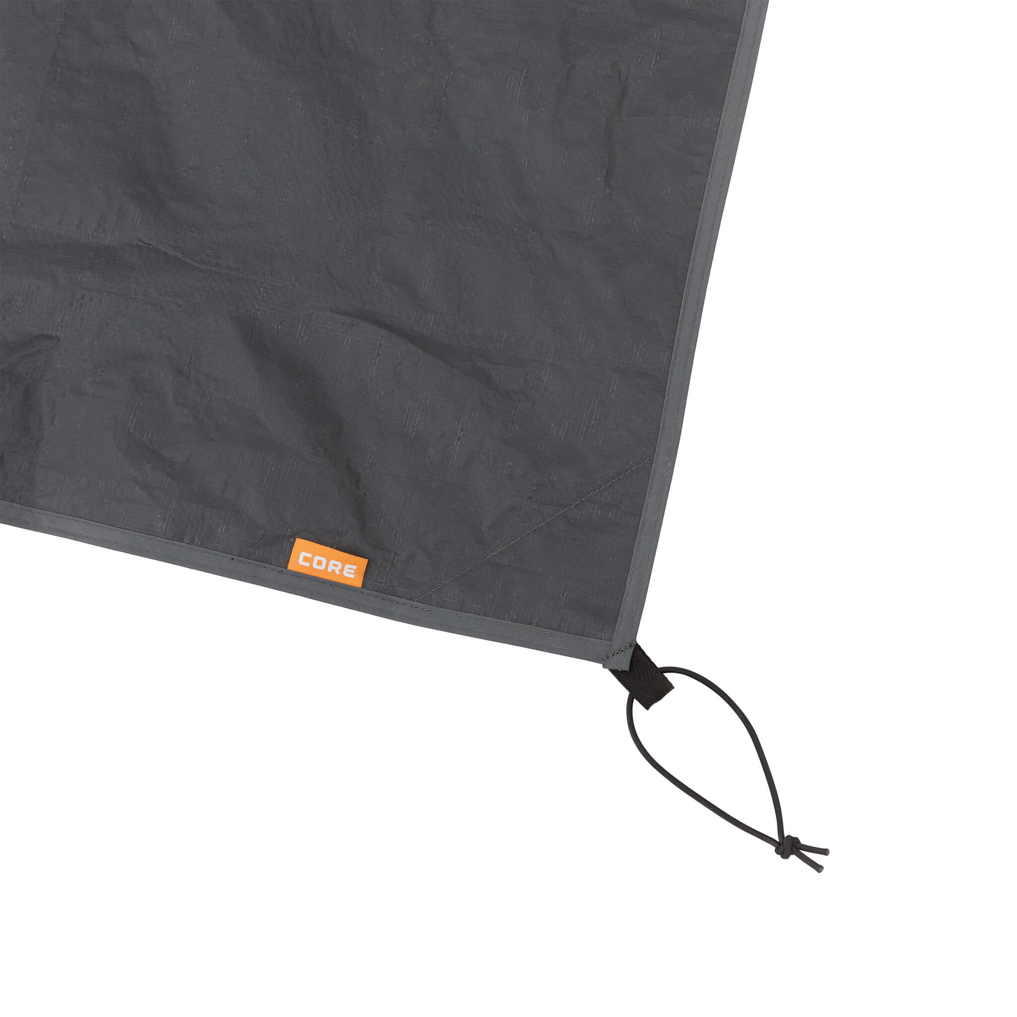 Close-up of CORE 11 person tent footprint corner with reinforced stitching and adjustable strap for secure setup.