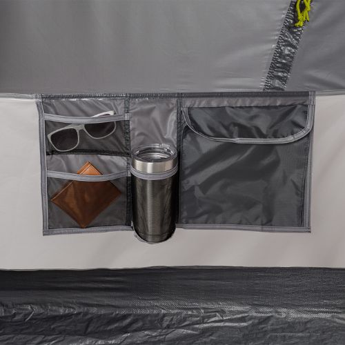 12 person instant cabin tent with full rainfly tent interior with storage pockets and a tumbler.
