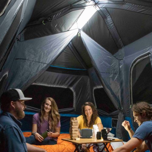 Inside view of CORE 12 person lighted instant cabin tent with lights on.