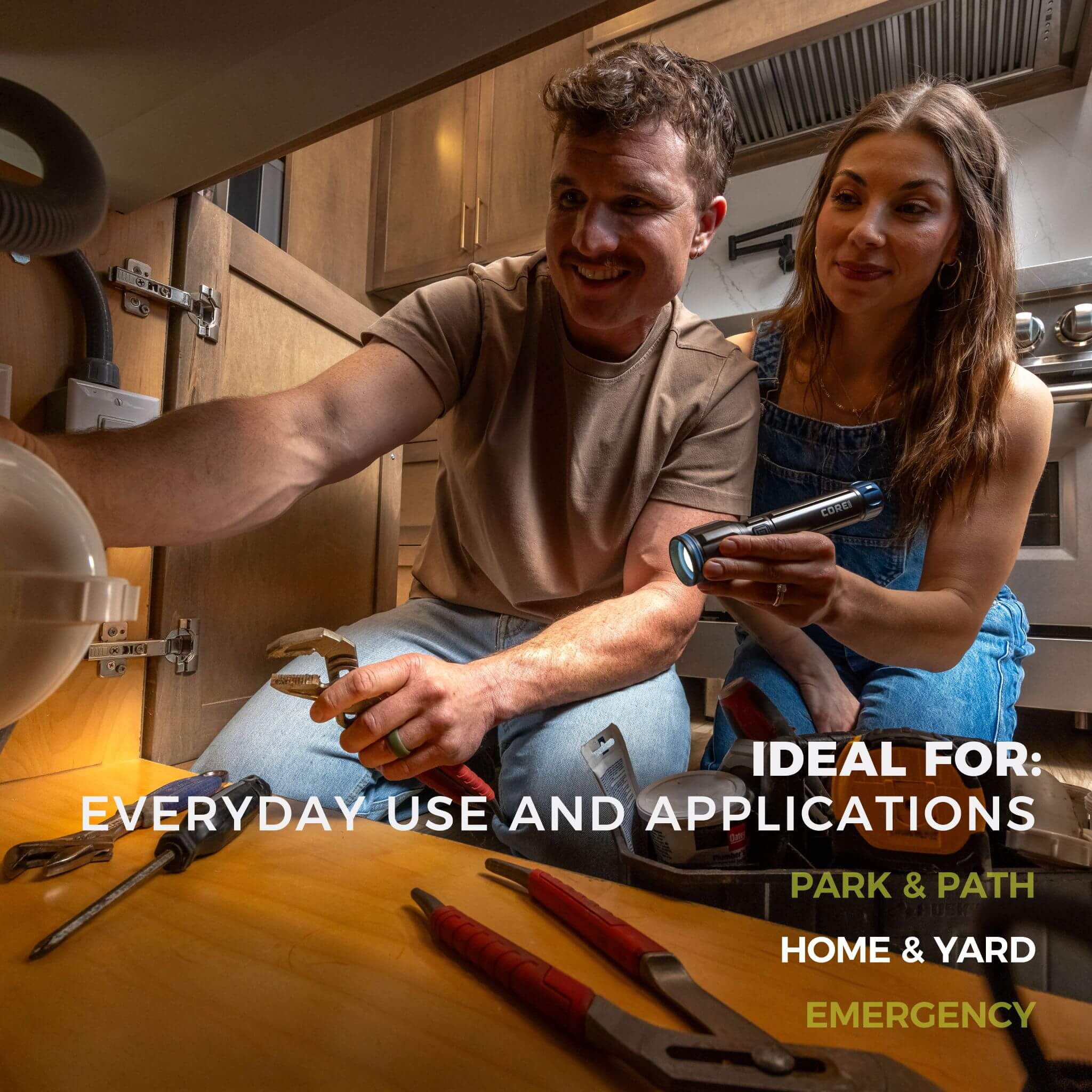 A man and woman using a flashlight under the sink with text "Ideal for: Everyday use and applications'.
