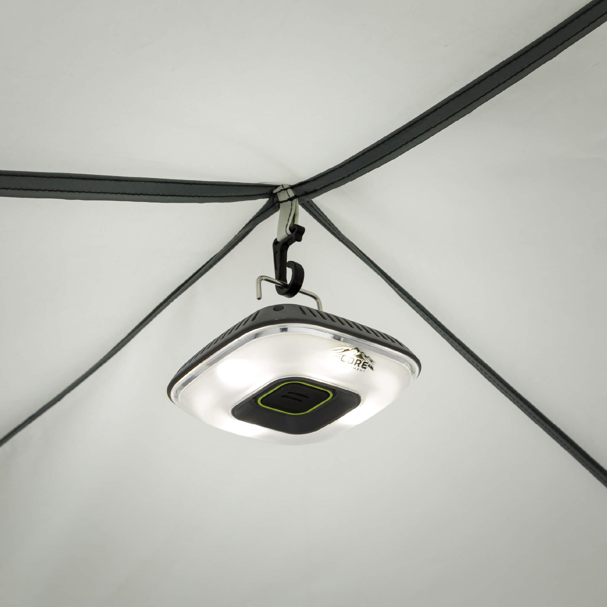 Interior view of CORE 12x10 instant screen house showing overhead hook for hanging lanterns, keeping space bright at night.