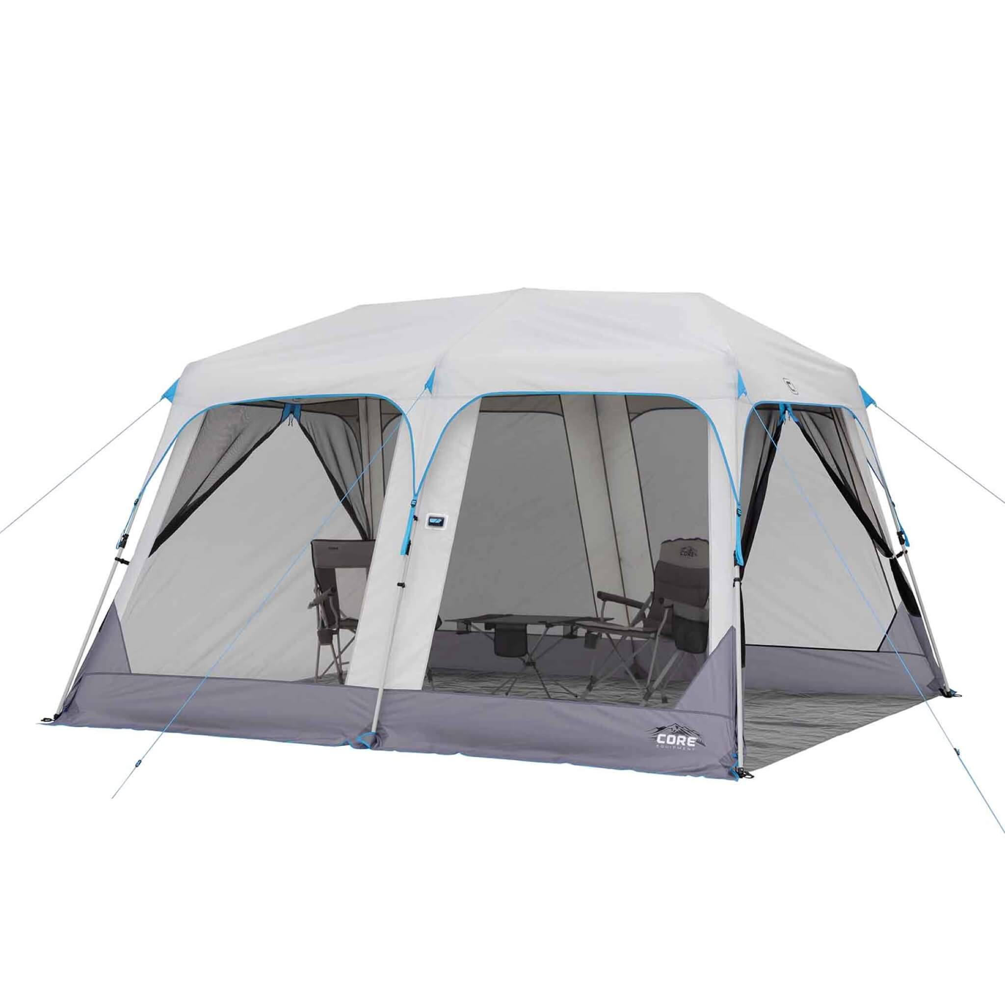 CORE 12 ft x 10 ft lighted instant screen house with chairs and table set up inside, providing shaded bug-free outdoor shelter.