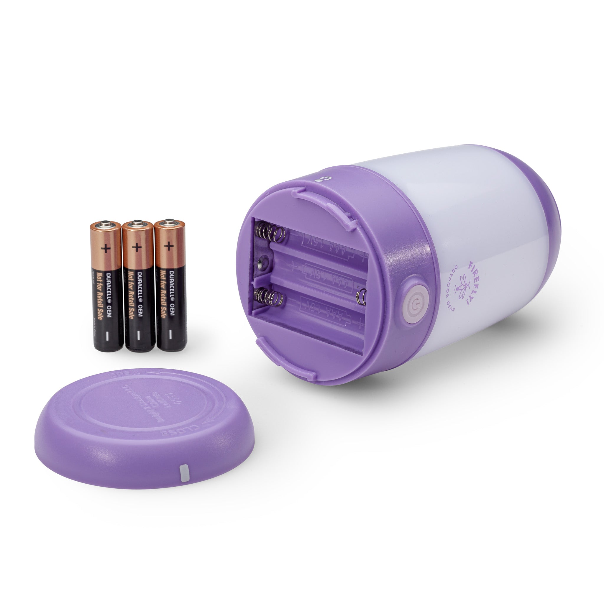 Purple and white 200 lumen lantern with bottom opened showing 3 AAA batteries.
