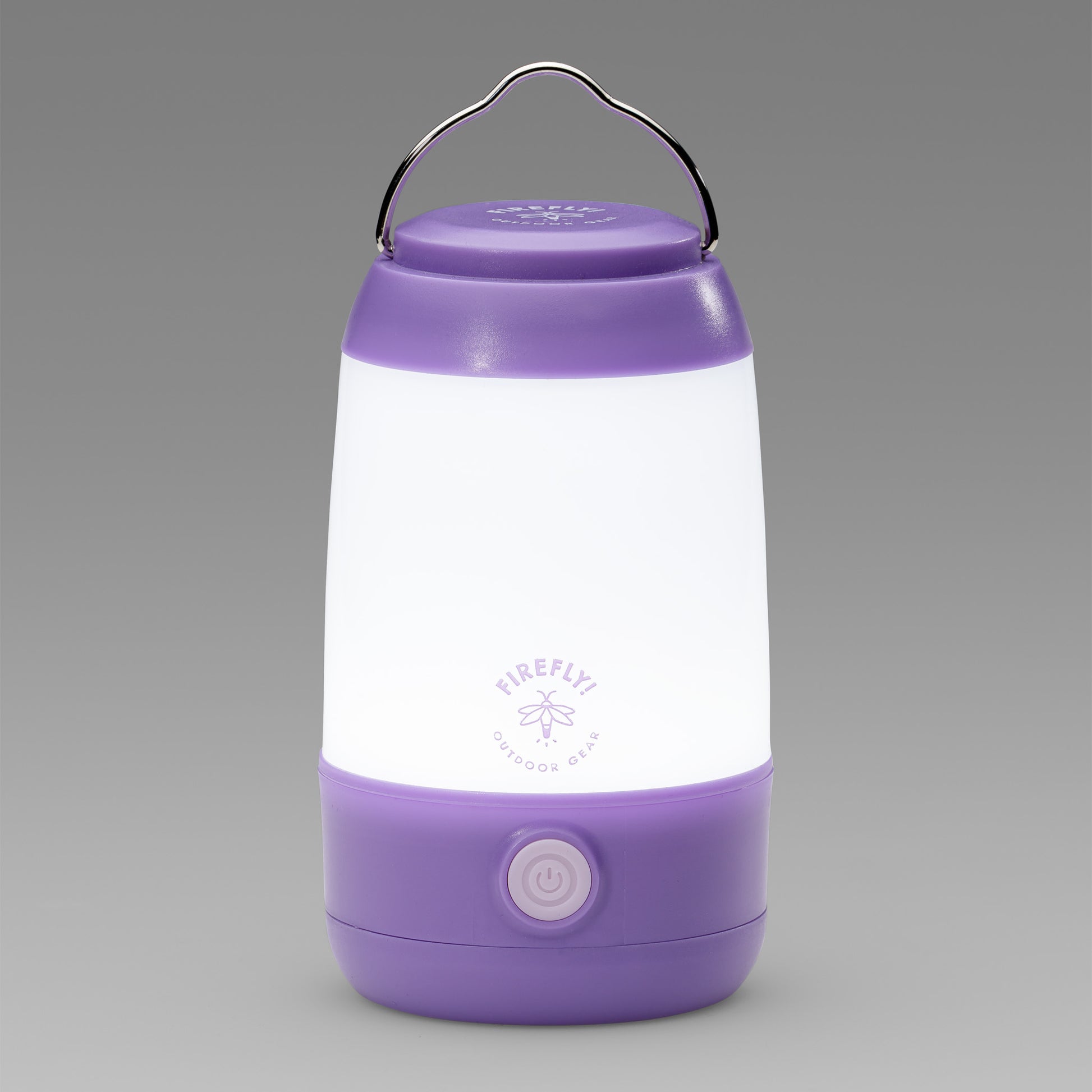 Purple and white camping lantern with visible brand logo on a gray background.