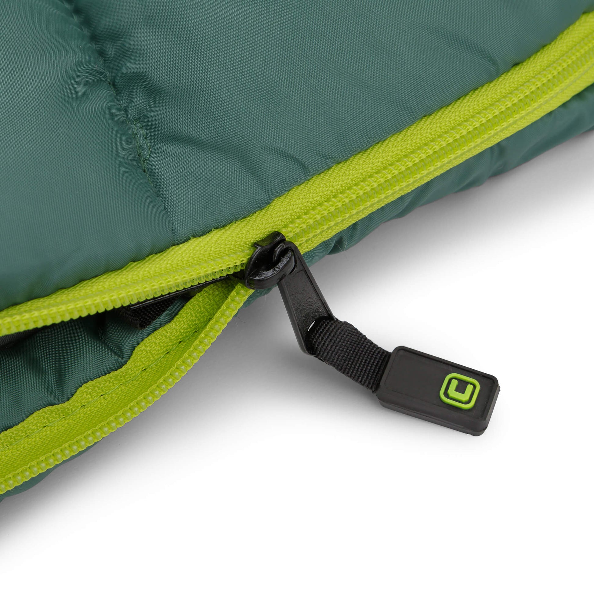 Close-up of CORE 30 degree sleeping bag zipper with lime green pull tab.