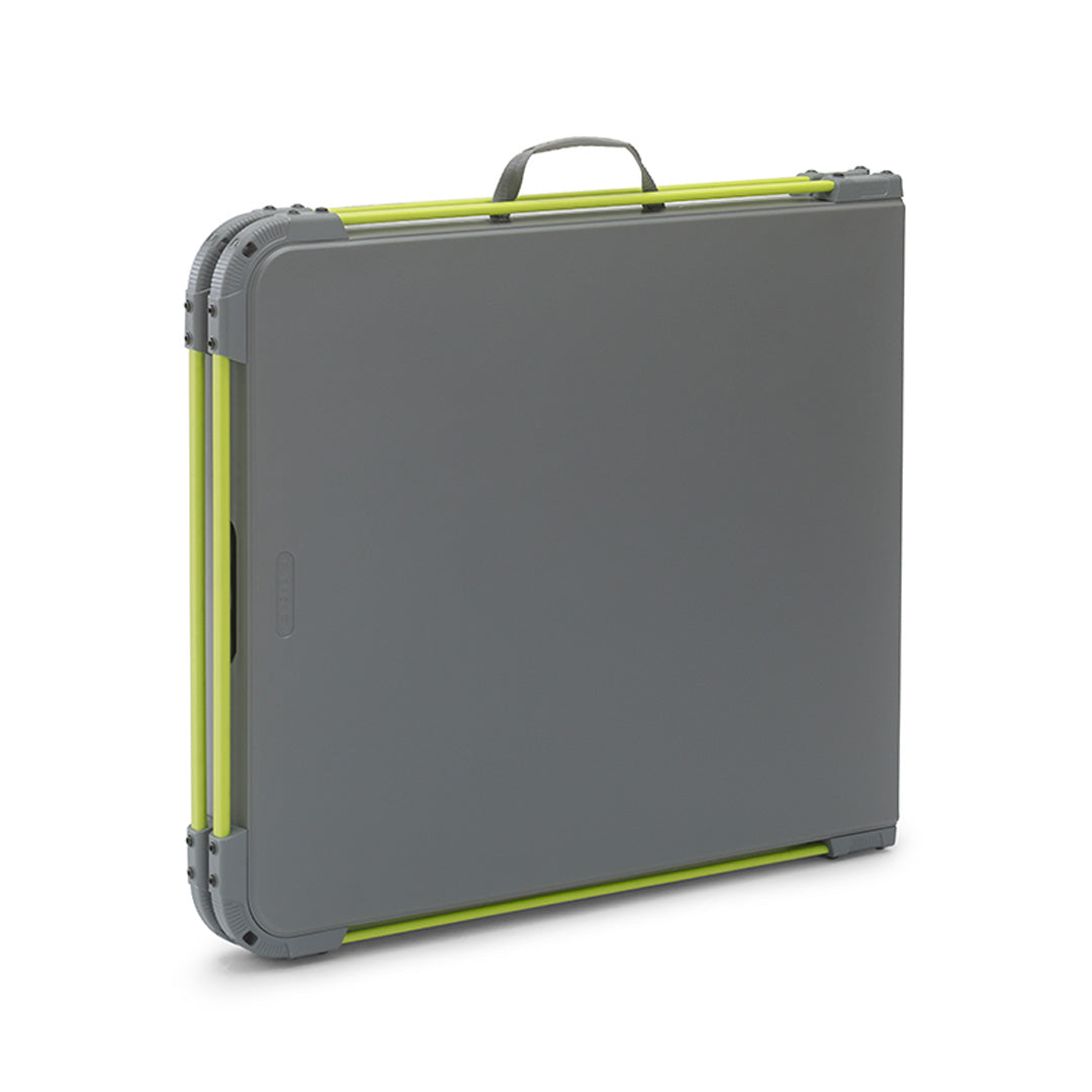 CORE folding cook table folded flat with handle for easy storage and transport.