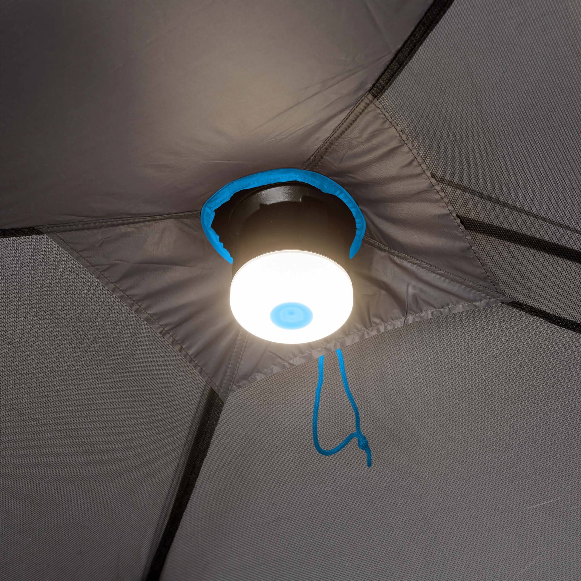 Close-up of CORE 6 person lighted dome tent ceiling light in gray with blue accents, shown attached to center hub for even interior illumination.