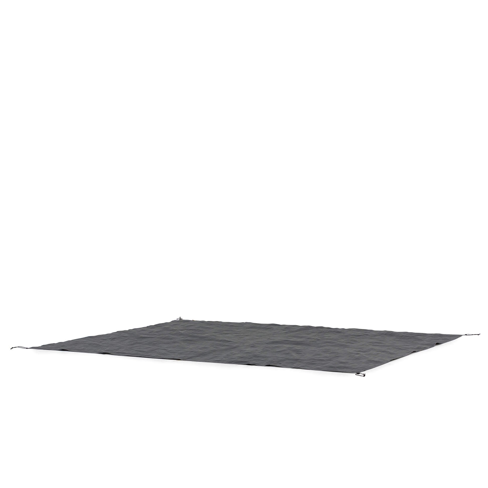 Angled view of CORE 6 person tent footprint showing waterproof design and compact rectangular shape for easy setup.
