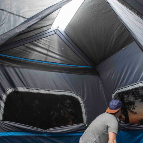 Inside view of CORE 9 person lighted instant cabin tent with lights on.
