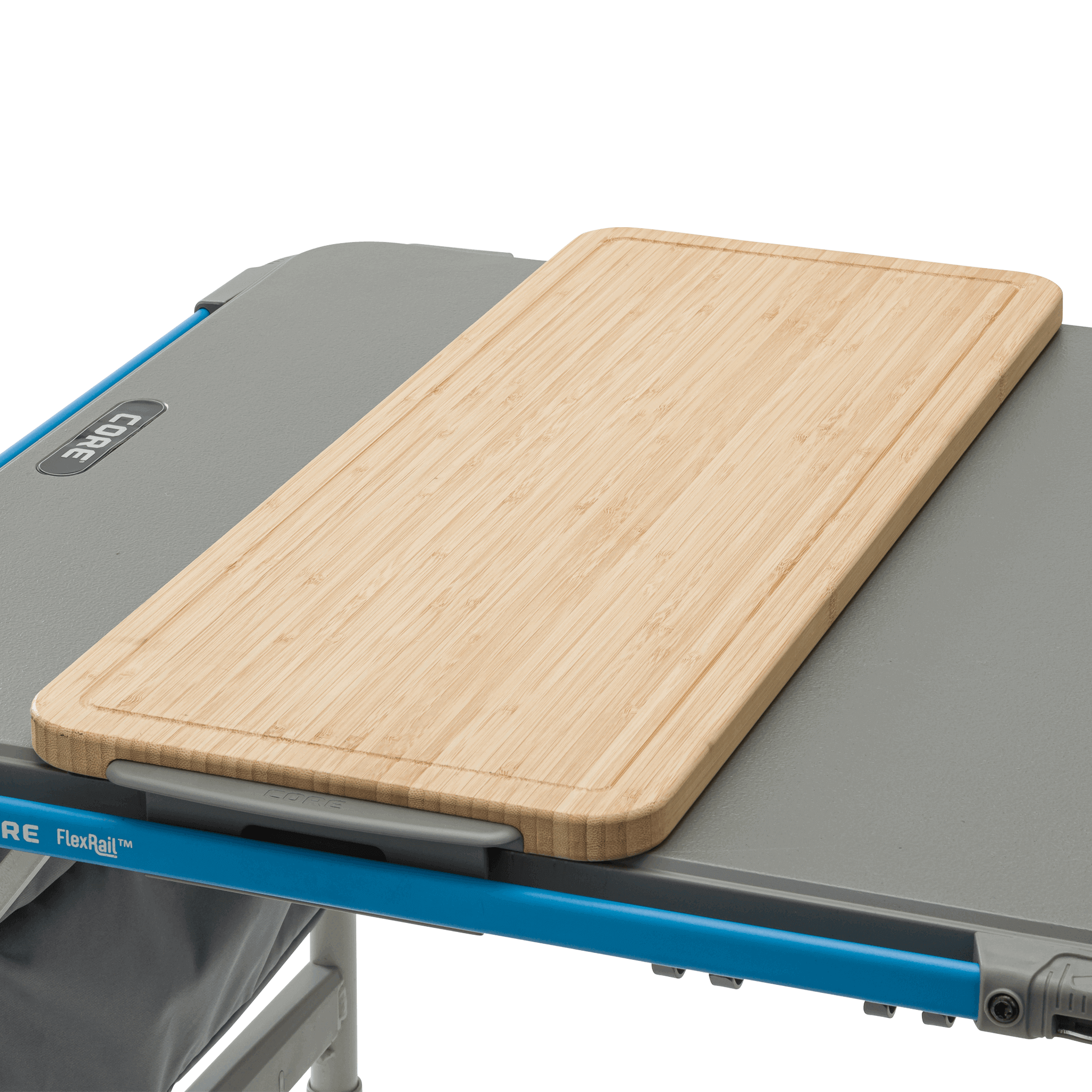 CORE bamboo cutting board accessory on camp kitchen table, designed to fit the 4 Foot FlexRail table for outdoor meal prep convenience.