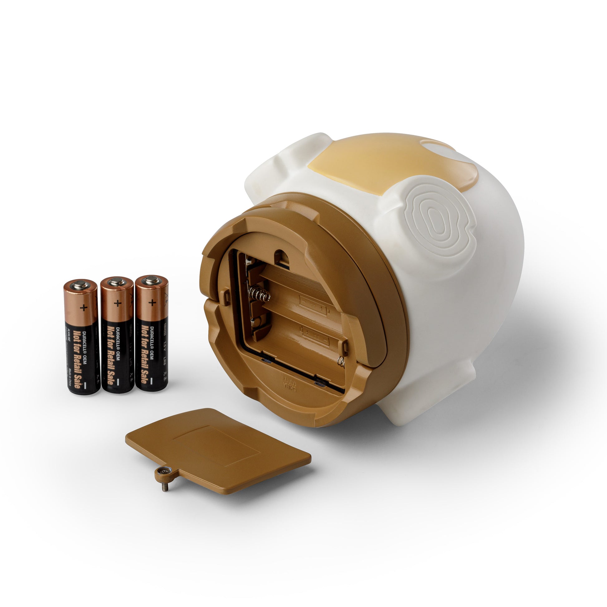 Campfire-shaped lantern with batteries on a white background.