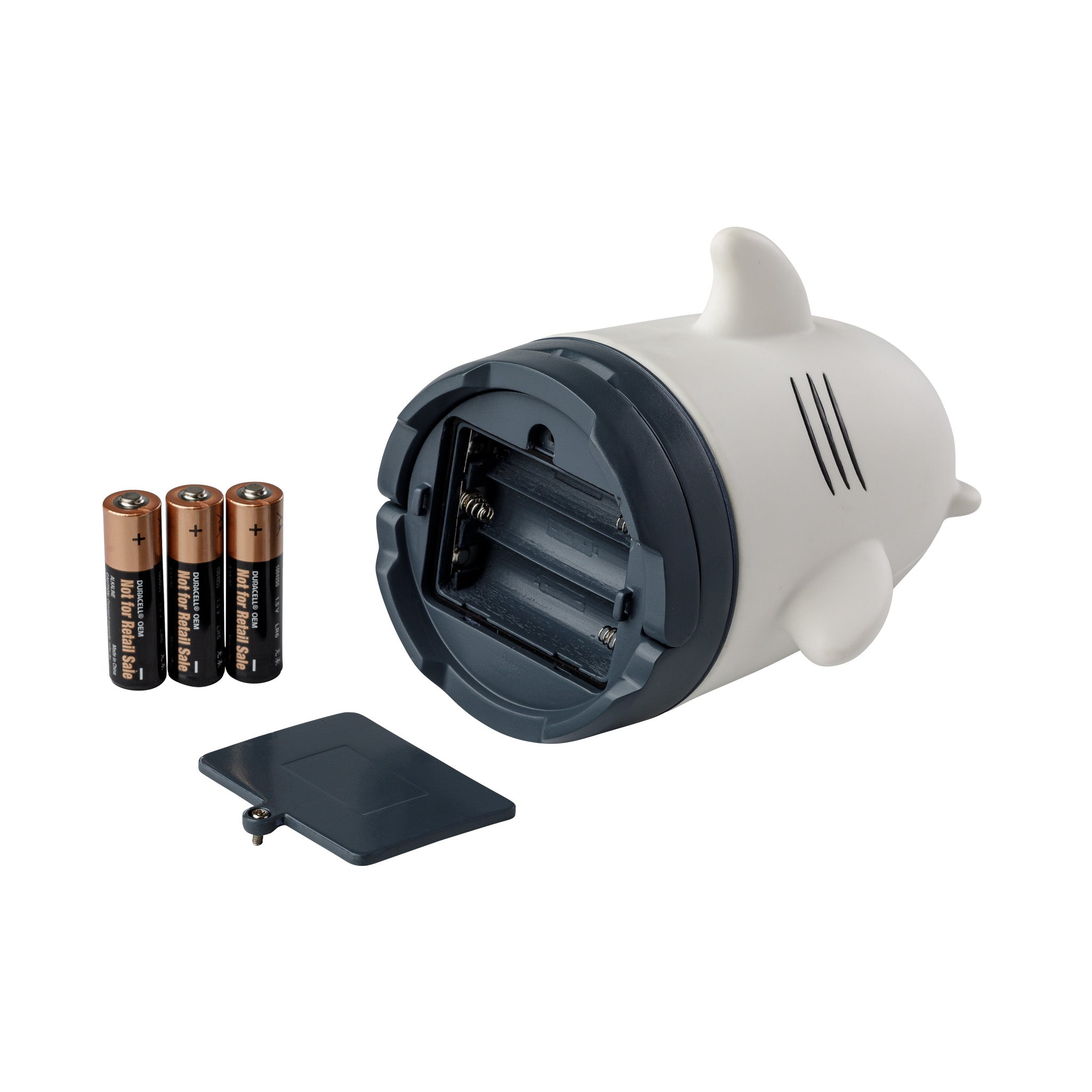 Shark-shaped lantern with batteries on a white background.