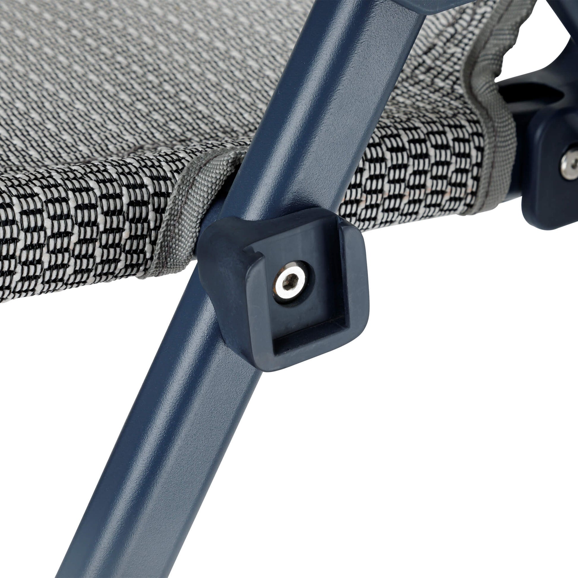 Close-up of CORE folding camping chair in navy frame showing reinforced frame connection, cup holder attachment, and durable fabric.