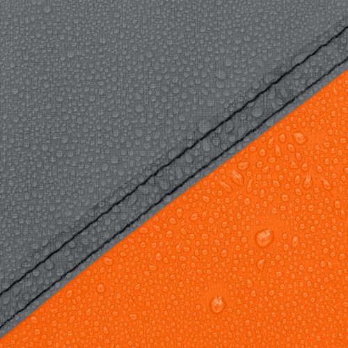 Close-up of CORE tent fabric showing water beading on weather-resistant material with sealed seam detail for rain protection.