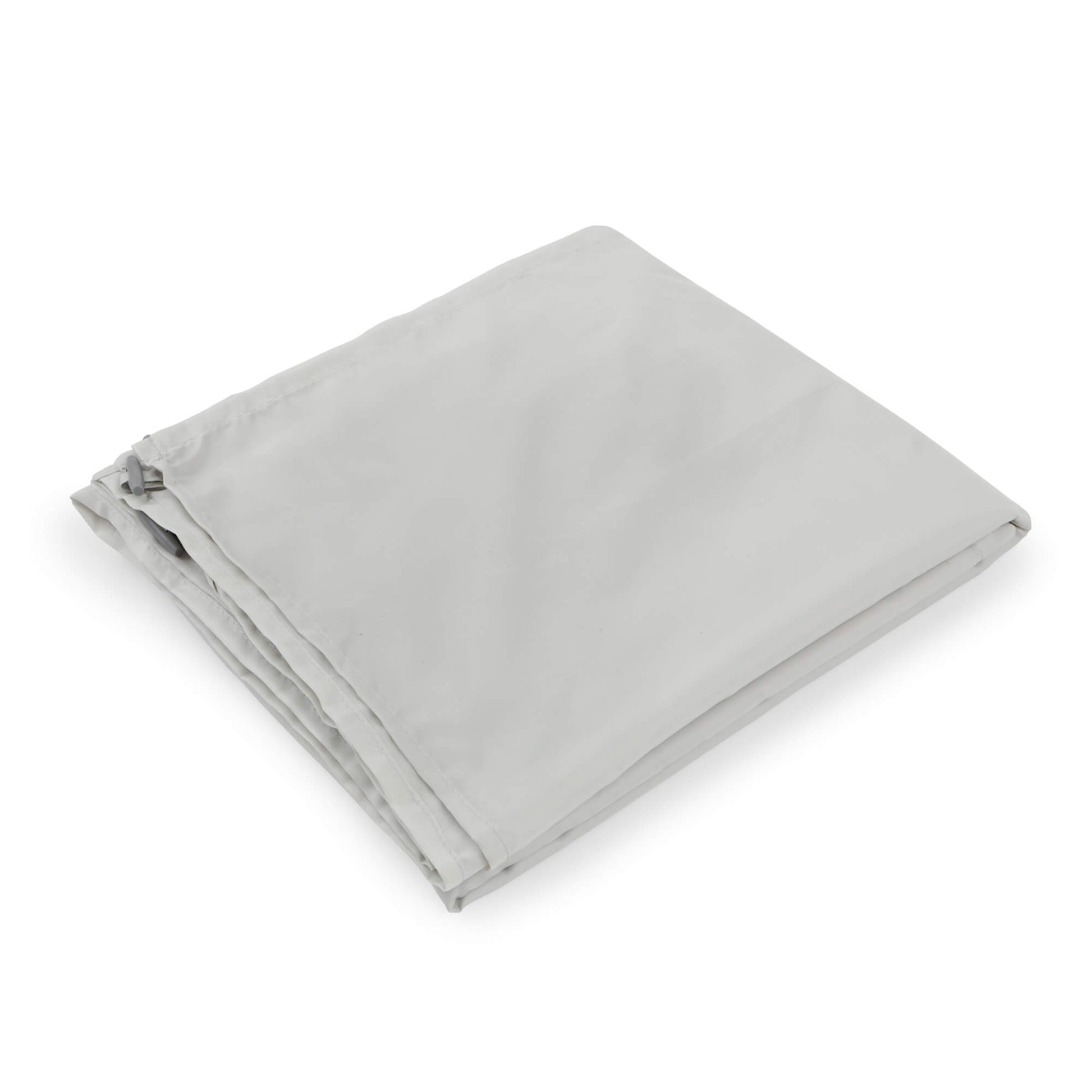 Folded light gray sleeping bag liner.