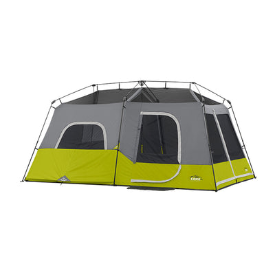 A gray and green outdoor camping tent by CORE, featuring multiple zippered entrances and windows. The CORE 9 Person Instant Cabin Tent is set up with its structure visible, suggesting it is spacious and designed for multiple occupants.