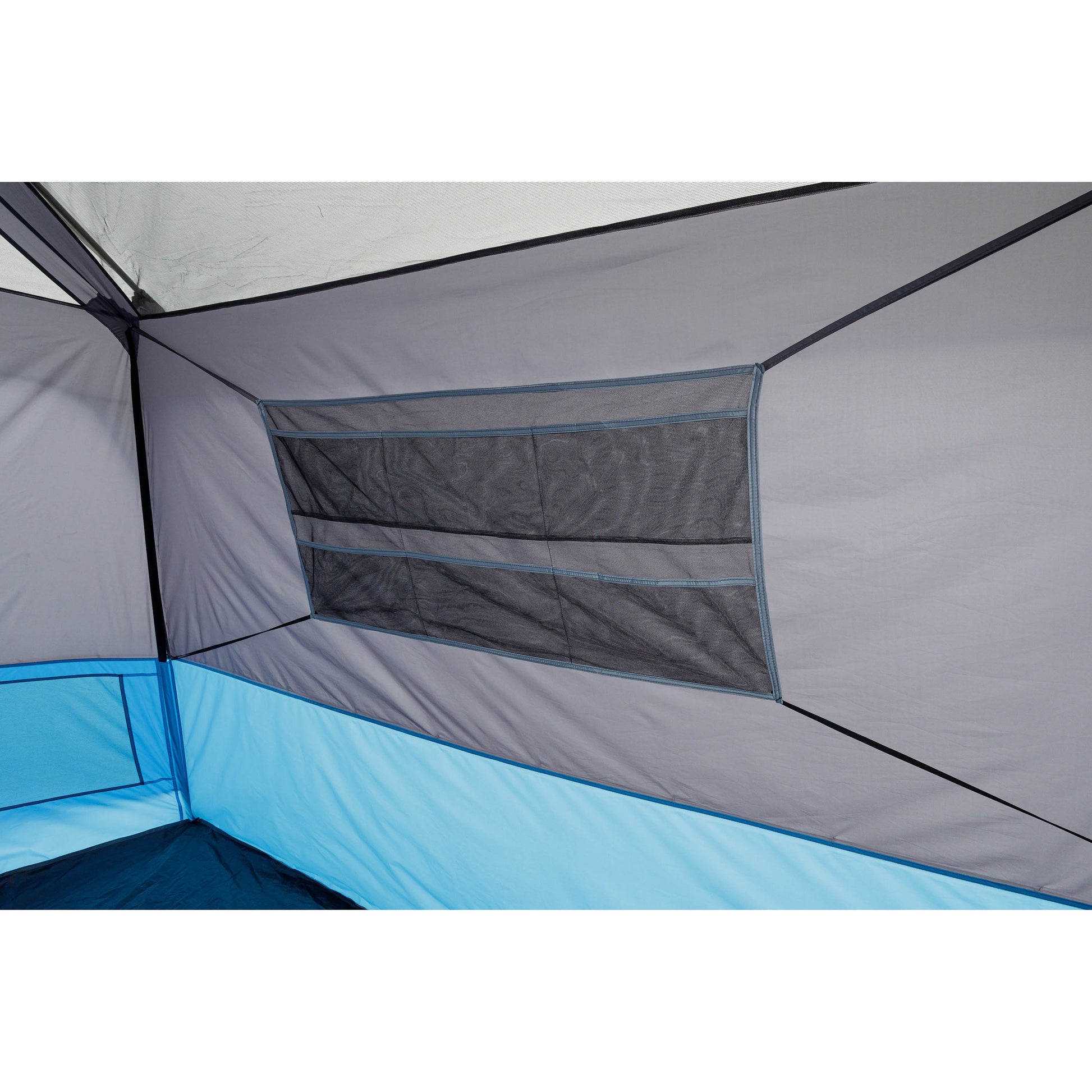 The interior view of the CORE 6 Person Lighted Instant Cabin Tent shows a mesh storage pocket attached to the side wall. The wall fabric is gray above and light blue below. The pocket has several compartments for organizing small items, and the tent's seams are visible, indicating a structured design.