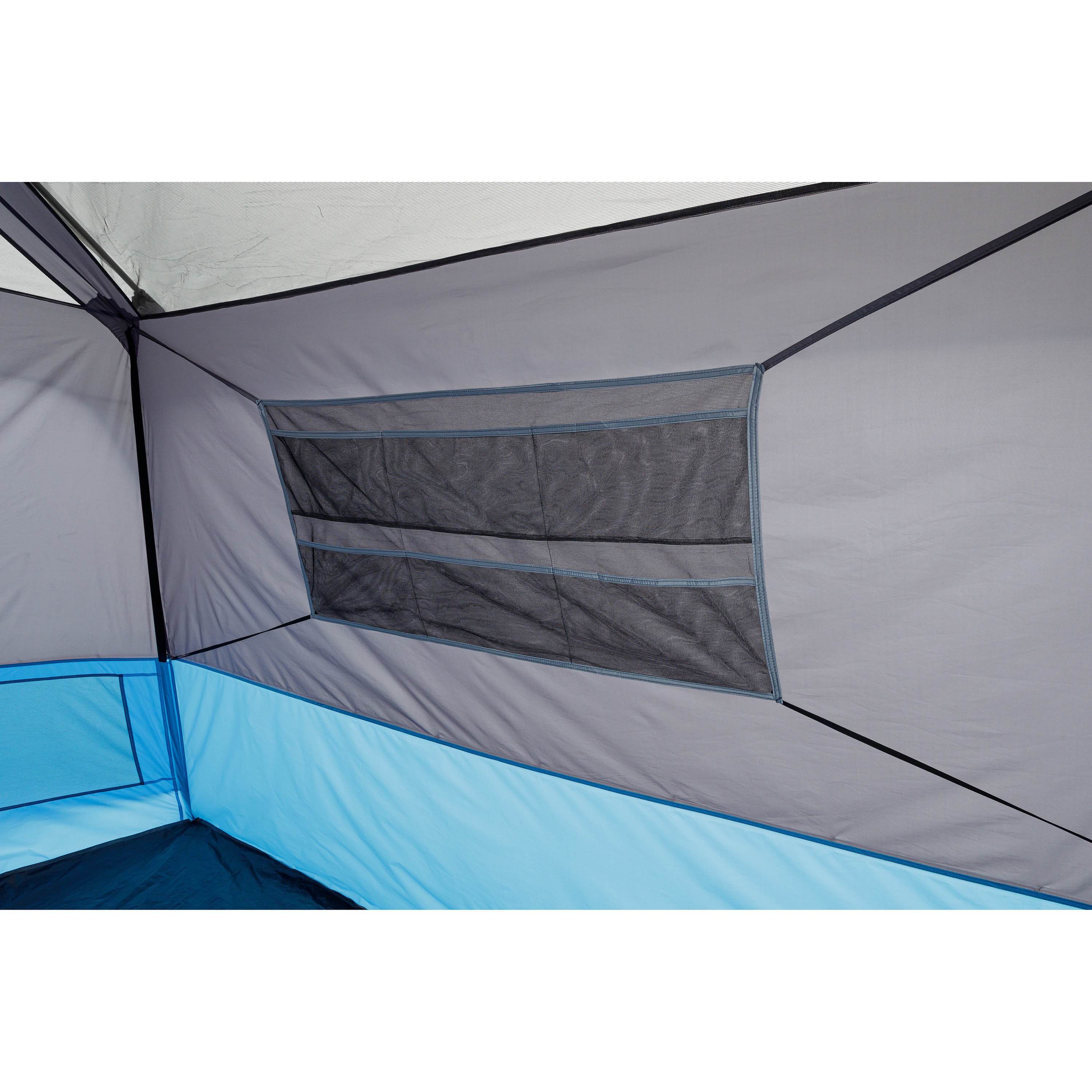 The interior view of the CORE 6 Person Lighted Instant Cabin Tent shows a mesh storage pocket attached to the side wall. The wall fabric is gray above and light blue below. The pocket has several compartments for organizing small items, and the tent's seams are visible, indicating a structured design.