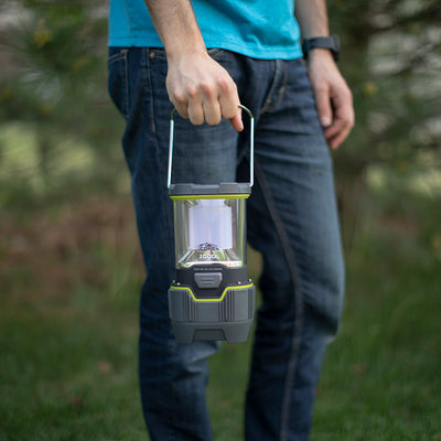 Lantern lifestyle image with person holding lantern to show scale